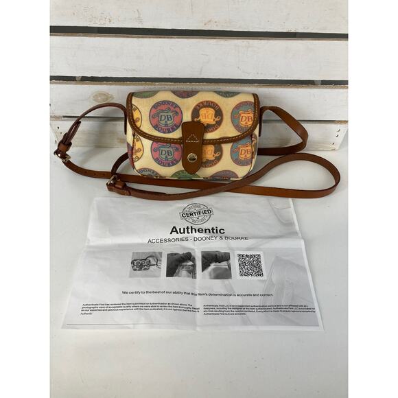 Dooney & Bourke Handbags - DOONEY & BOURKE MINI COATED CANVAS CROSSBODY BAG